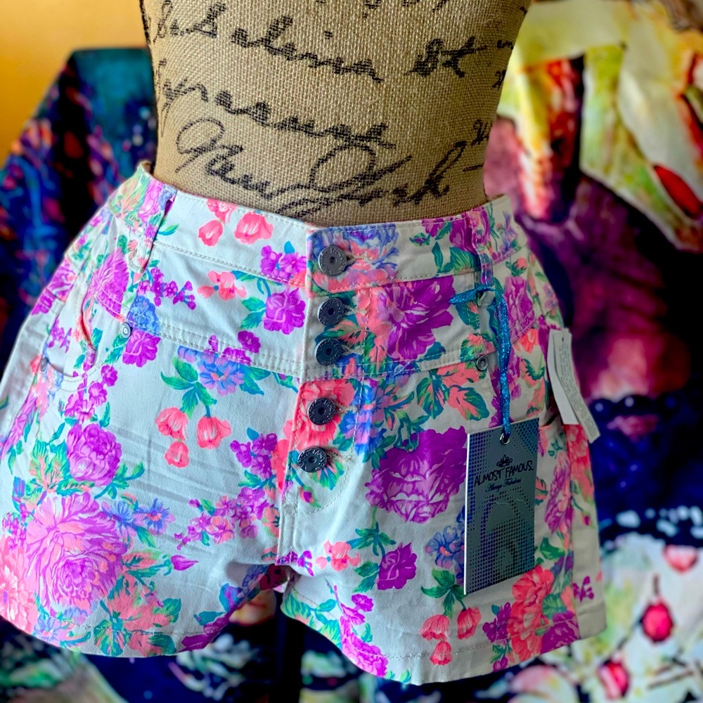 High waisted jean shorts. Flowers. Never worn.